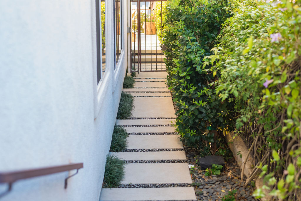 Concrete Pathway with Glued Pebbles in the spacing between the concrete in Pacific Palisades
